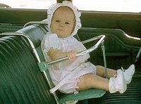 car seat from the 60s used for running errands with a baby